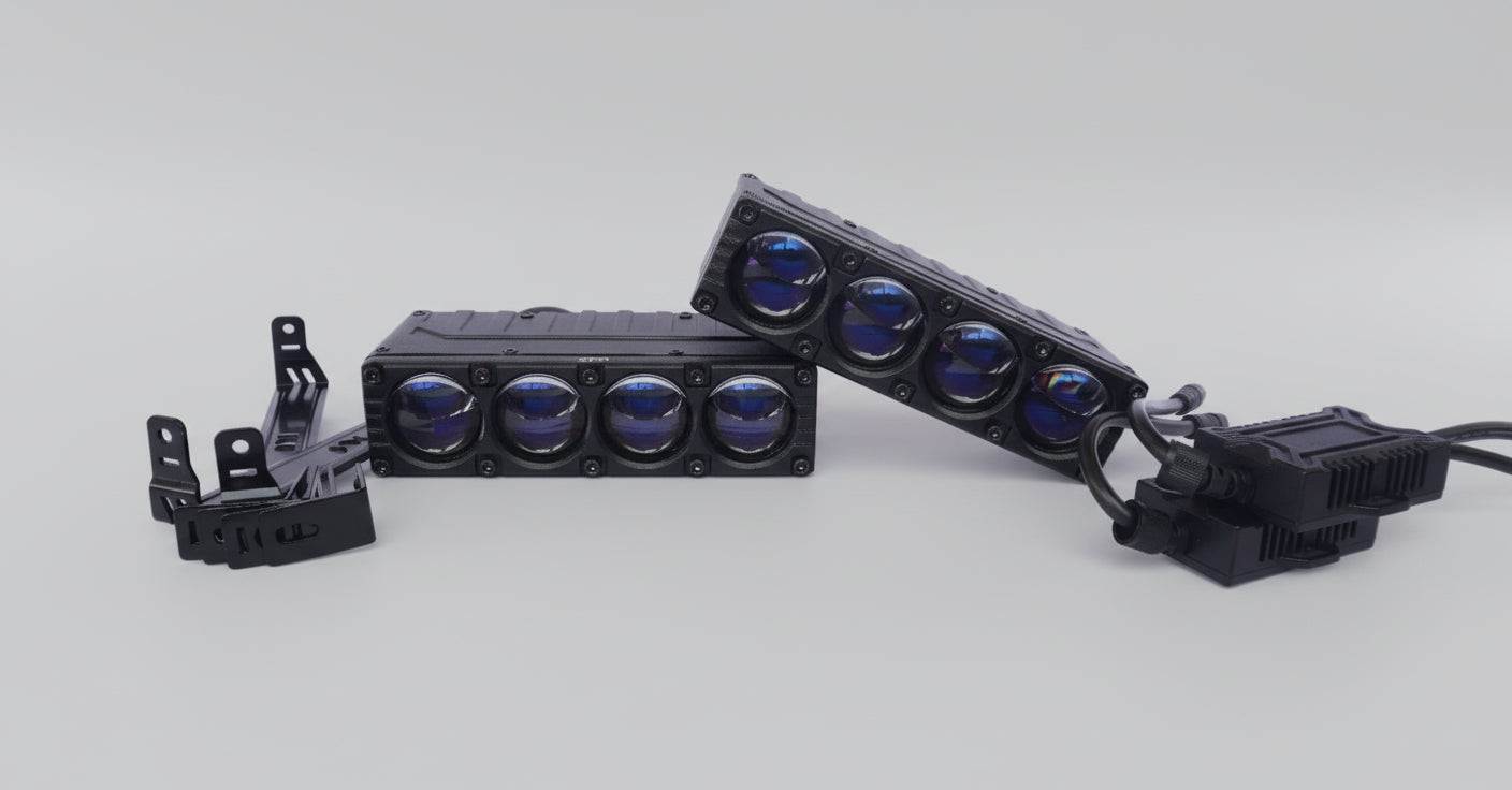 Two LED light bars with blue lights on a white surface