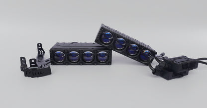 Two LED light bars with blue lights on a white surface