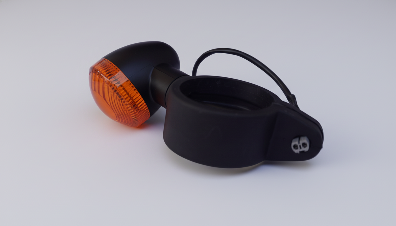 Black and orange turn signal light on a white background