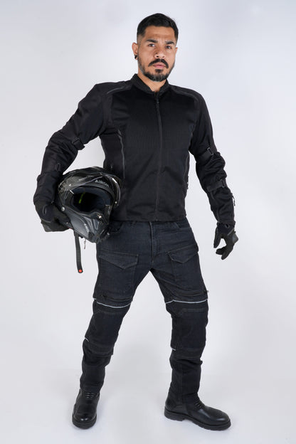 Rollin’Denims Outlaw CORE-X charcoal black riding cargo pants, front view on a standing rider, at MotoARZT.