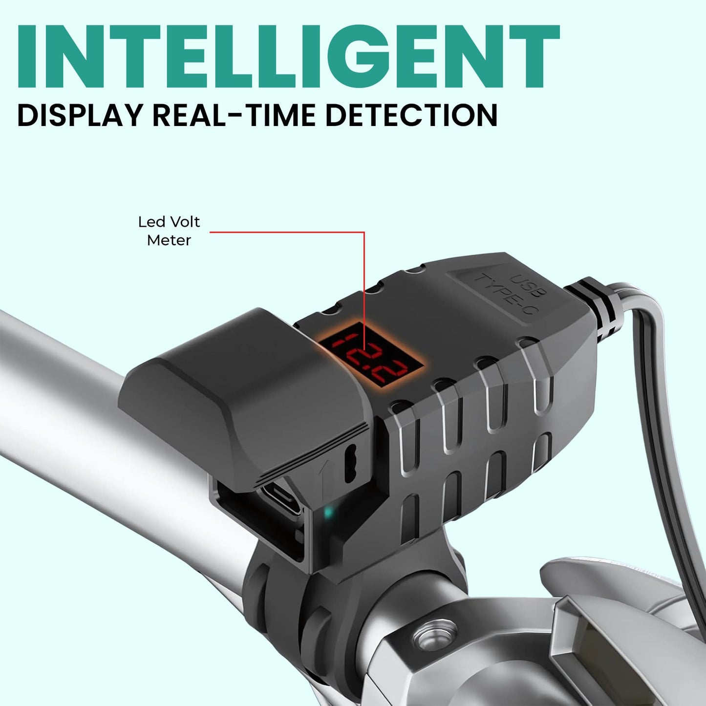 Digital voltage meter attached to a motorcycle handlebar with 'INTELLIGENT DISPLAY REAL-TIME DETECTION' | MotoARZT