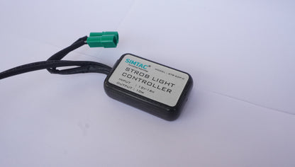 Stror light controller with wiring on a white background