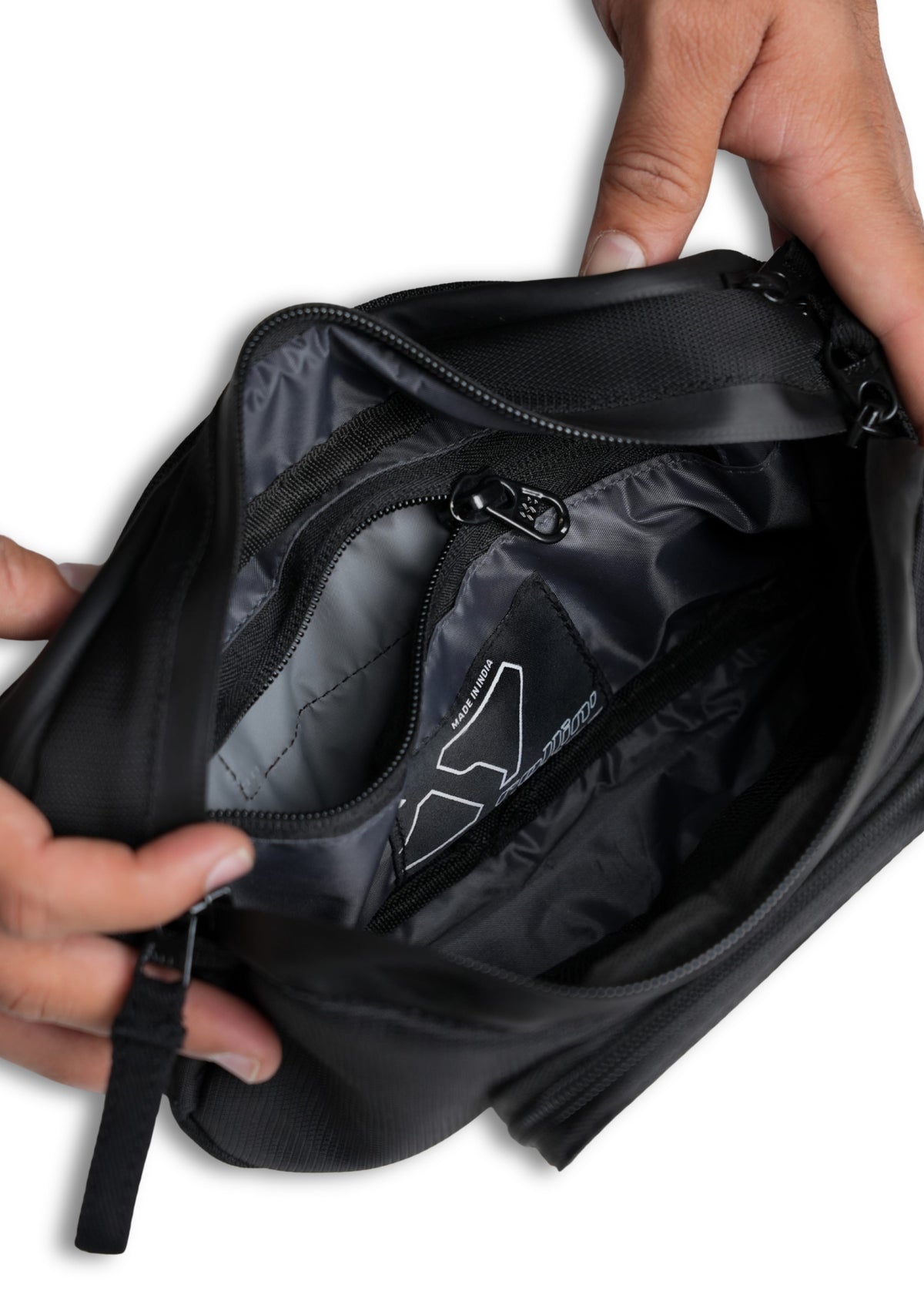 Shift-Pack_08.jpg: Open Rollin’Denims Shift-Pack showing the main compartment, inner zip pocket and branded lining, at MotoARZT.