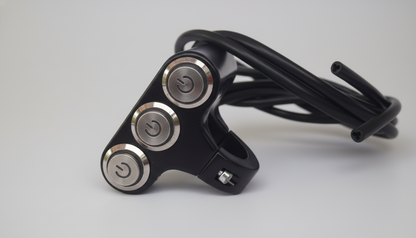 Three-headed electric shaver on a light gray background