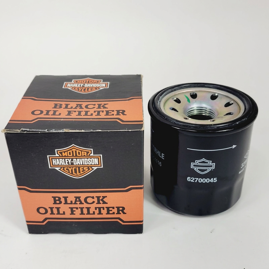 Harley-Davidson black engine oil filter 62700045 beside its orange-and-black Black Oil Filter packaging.