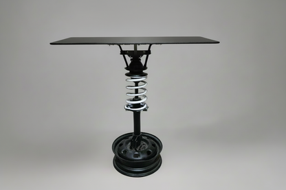 hocker suspension side table with white spring and wheel rim base - Unique motorcycle-inspired home decor